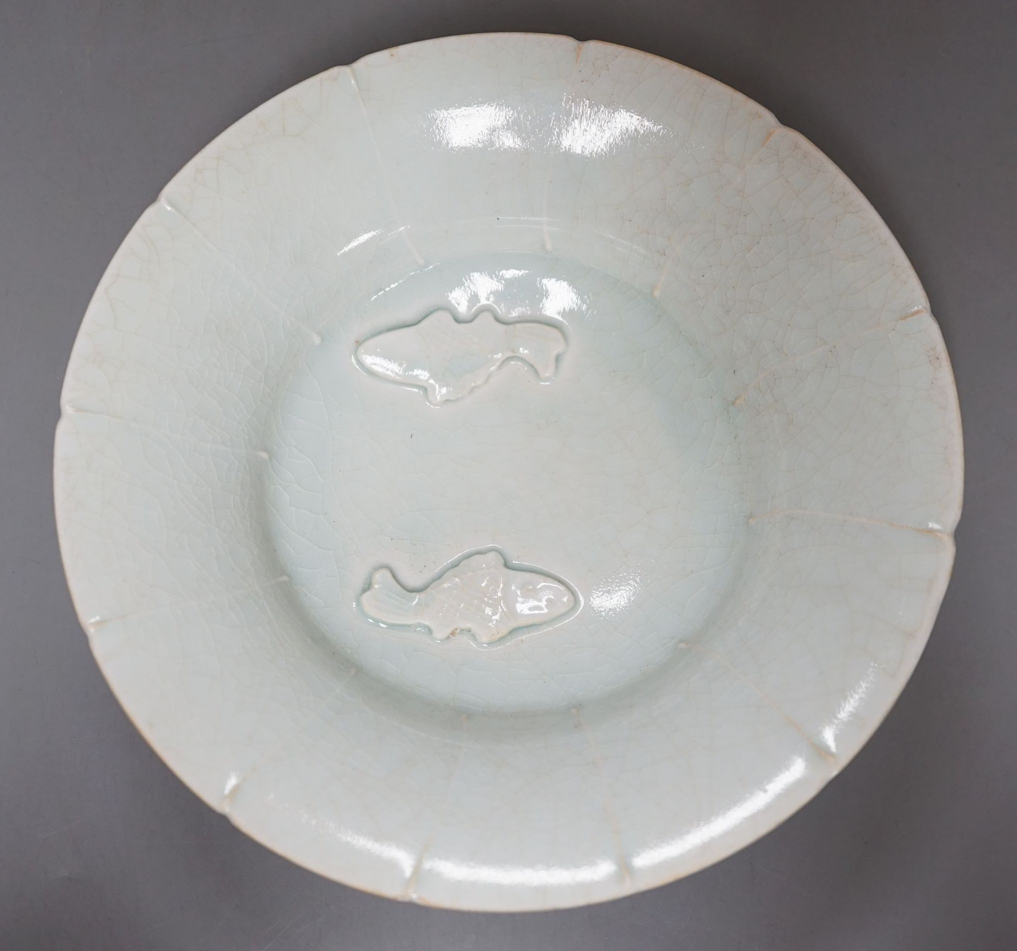 A Chinese Qingbai type twin fish bowl, 18cms diameter.